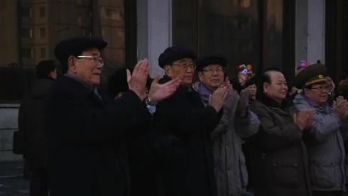 Senior Korean Workers' Party and DPRK Government official applaud as rocket launch personnel depart Koryo Hotel in central Pyongyang on 4 January 2013.  Seen in this image are (L-R): Kim Yong Nam, Choe Yong Rim, Kim Ki Nam, Choe Tae Bok, Pak To Chun and VMar Kim Yong Chun (Photo: KCTV screengrab)