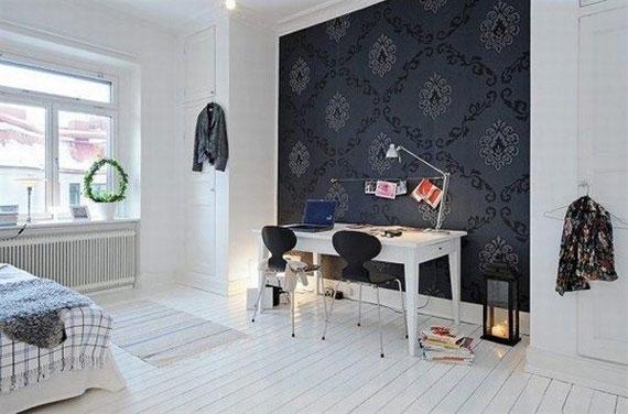 Color Roundup: Using Black in Interior Design black accent wall in a bedroom