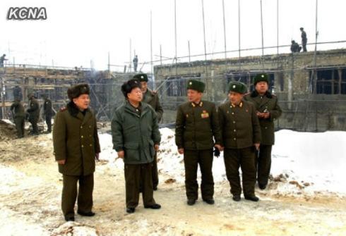 KPA General Political Department Director Gen. Choe Ryong Hae (2nd L) inspects construction work at the Turf Institute of the State Academy of Sciences (Photo: KCNA)