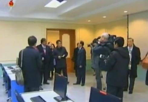 Bill Richardson, Eric Schmidt and members of their delegation tour a classroom at the E-Library at Kim Il Sung University (Photo: KCTV screengrab)