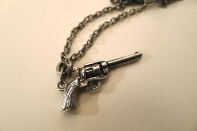 evolution now padlock and revolver necklaces
