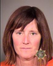 Another ELF case set for trial in Eugene: Rebecca Rubin This undated photo provided by the Multnomah County Sheriff's Office in Portland, Ore., shows Rebecca Rubin, 39, of Canada, who turned herself in to face federal charges alleging she was part of a radical environmental group based in Eugene, Ore., known as The Family. Federal authorities blame the group for 20 fires across the West between 1996 and 2001 that did $40 million in damage. Rubin was to be arraigned Friday, Sept. 11, 2013 in U.S. District Court in Eugene, Ore., on conspiracy and arson
