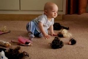 Baby Mikey w/decapitated Barbies