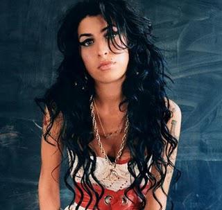 Amy Winehouse, 27, found dead at her London flat.