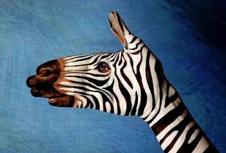animal painted on hand