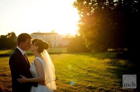 A look back at a year of wedding photography ( bit late I know! ) Bride and groom kiss in the sunset at Newick park