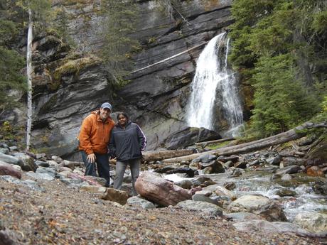 Lauren and I at a waterfall in Glacier National Park Road Trip from Florida to Alaska