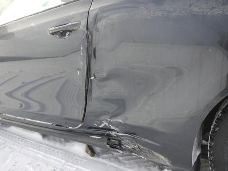 DENT IN VW GTI Damage on our road trip from Florida to Alaska