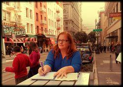 Here I am writing plein air poetry on Powell Street in San Francisco: the town where Imogen lived.