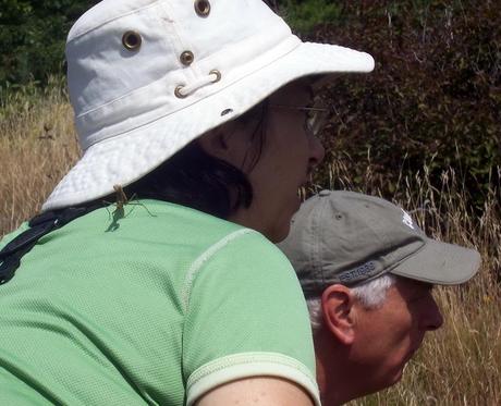 Jean and Bob watch deer running away