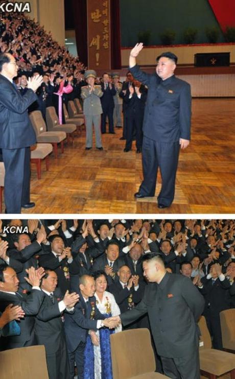 Kim Jong Un greets party cell secretaries during a commemorative photo session with party cell secretaries' meeting participants (Photos: KCNA)