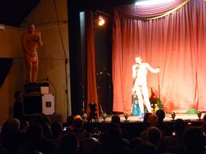 Left stranded and penniless in Brighton by a nationally famous British comedian Bob Slayer atop speakers and Martin Soan on stage