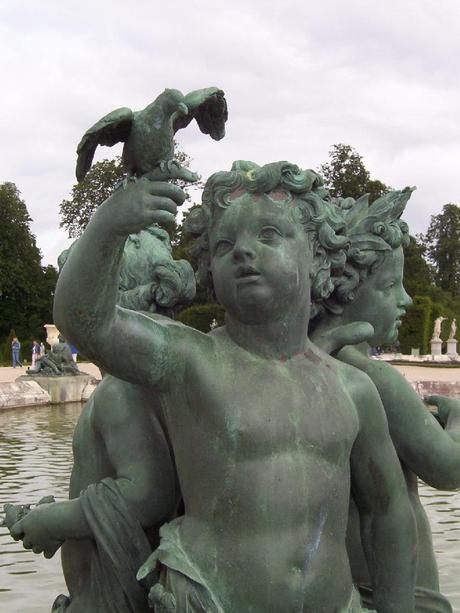 Palace of Versailles - Statue of children with a bird- France
