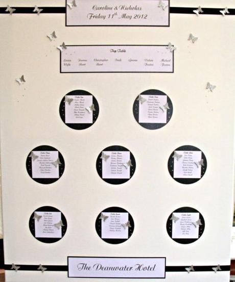 black_white_wedding_seating_plan_with_silver_butterflies