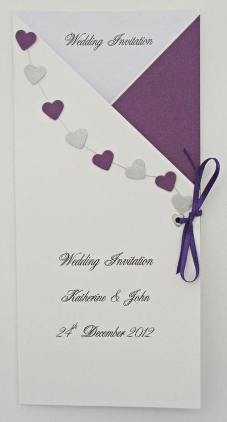 wedding invitation with purple hearts