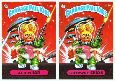 two Garbage Pail Kids trading cards, both with identical art showing alien invader carrying earth woman with flying saucers, example of cards with duplicate art only difference being kid names and card ID numbers