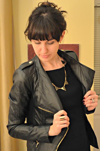 leather jacket and gold necklace