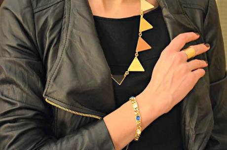 gold jewelry and leather