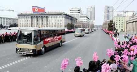 Nuclear Test Personnel Visit Ku’msusan and Revolutionary Martyrs’ Cemetery After Arriving in Pyongyang A motor coach ferrying personnel involved in the DPRK's third underground nuclear test passes through Kim Il Sung Square in central Pyongyang on 20 February 2013 (Photo: Rodong Sinmun)