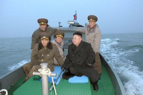 Kim Jong Un (2nd R) rides on a small vessel in the West Sea during his inspection of Jangjae ad Mu Islets.  Also seen on the boat are VMar Choe Ryong Hae (3rd L) and Gen. Kim Yong Chol (R) (Photo: Rodong Sinmun)