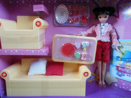 Dolly Review: Kurhn Doll with Living Room Set Kurhn on her card