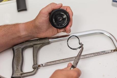 holding camera uv filter with pliers