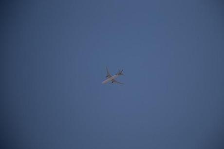 jet airliner flying overhead