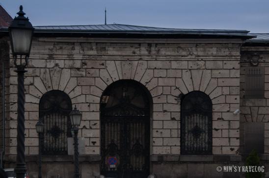 Budapest’s Architecture The building at Buda side that shows all the gun shots of WWII on it's preserved facade today.