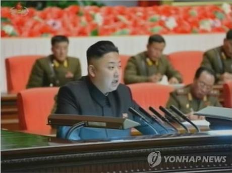 Kim Jong Un addresses the national meeting of KPA information personnel at the 25 April House of Culture in Pyongyang on 28 March 2013 (Photo: KCTV-Yonhap)