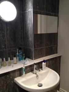 strange mirror/column/sink placement.  