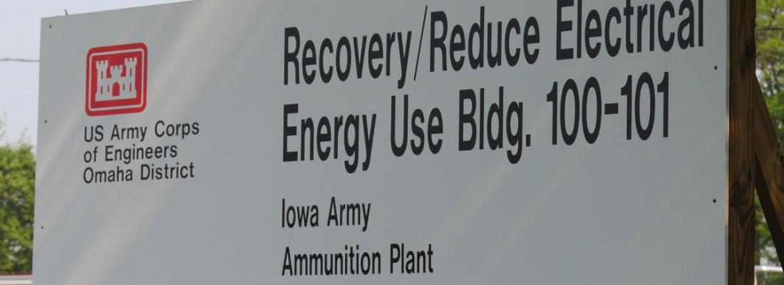 A sign at the Iowa Army Ammunition Plant announces the construction of new geothermal and photovoltaic systems at its administration building. (Credit: U.S Army photo)