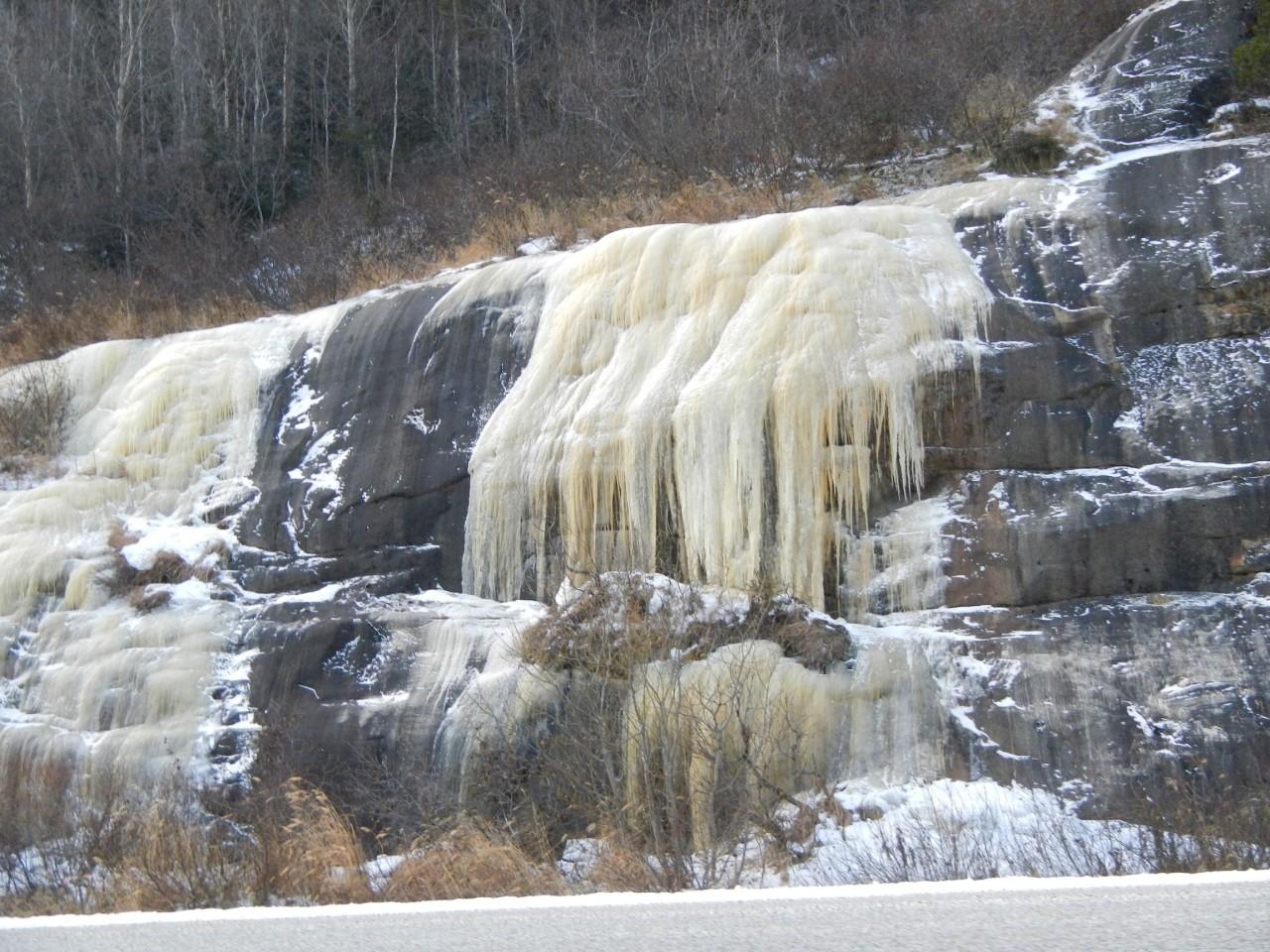 Ice forming on roadside rocks