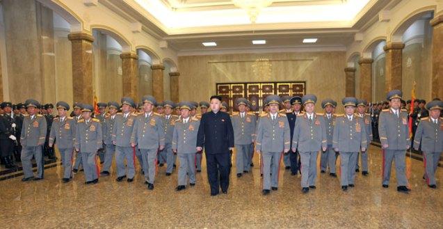 Kim Jong Un (7th L) and members of the Party Central Military Commission and DPRK National Defense Commission visit Kumsusan Palace of the Sun in Pyong at midnight on 15 April 2013 on the 101st anniversary of the birth of his paternal grandfather the late DPRK President and founder Kim Il Sung (Photo: Rodong Sinmun)