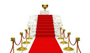 yellow-trophy-on-top-of-red-carpet