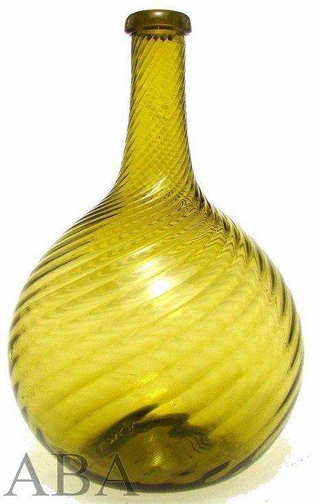 Molded Globular flask with spiral ribs - Lot 126 - American Bottle Auction