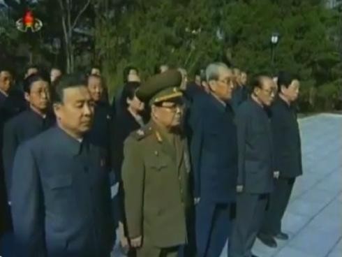 Members of the DPRK's central leadership attend a wreath-laying ceremony at Kang Pan Sok's grave in Pyongyang on 22 April 2013  In attendance at the graveside ceremony are Mun Kyong Dok (L), VMar Kim Yong Chun (2nd L), Kim Ki Nam (3rd L), Yang Hyong Sop (4th L) and Ro Ru Chol (5th L) (Photos: KCTV screengrabs) 
