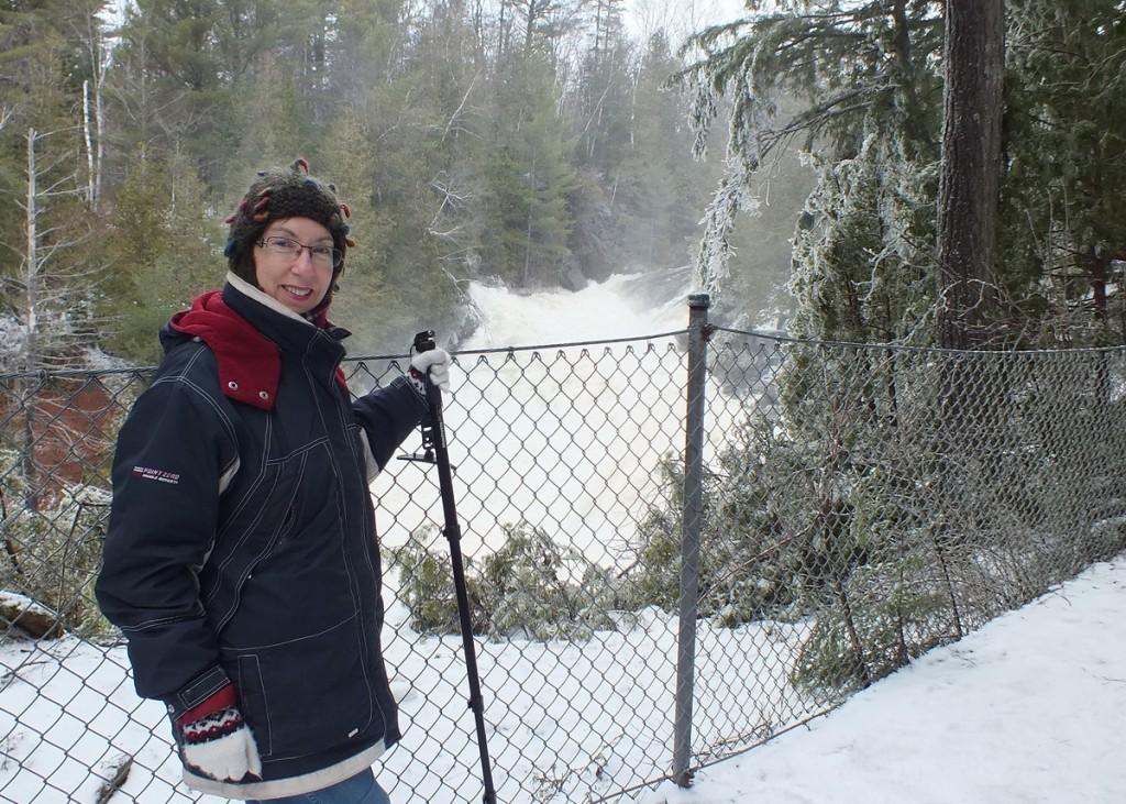Ragged Falls - Jean stands overlooking raging waters - Oxtongue River - Ontario - April 20 2013