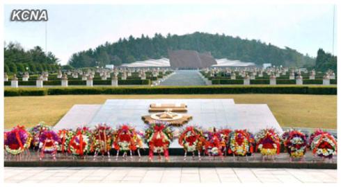 Floral wreaths placed in front of a monument and memorial stones at the Revolutionary Martyrs' Cemetery in Pyongyang to mark the official foundation of the country's military (Photo: KCNA)