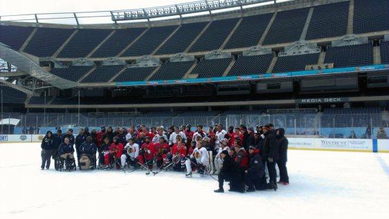 The Chicago Blackhawks pose for a picture at Soldier Field.  They skated with the USA Warriors Ice Hockey Program.