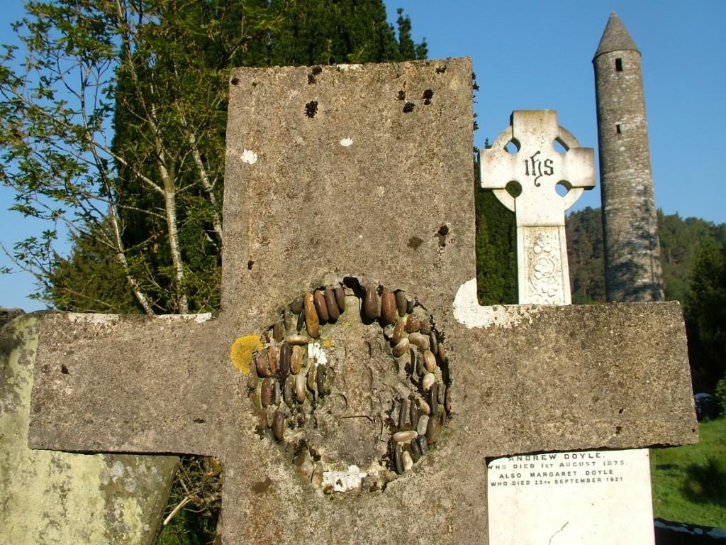 Glendalough, one of the most beautiful places in Ireland Gravestones and The Round Tower - Glendalough - Ireland