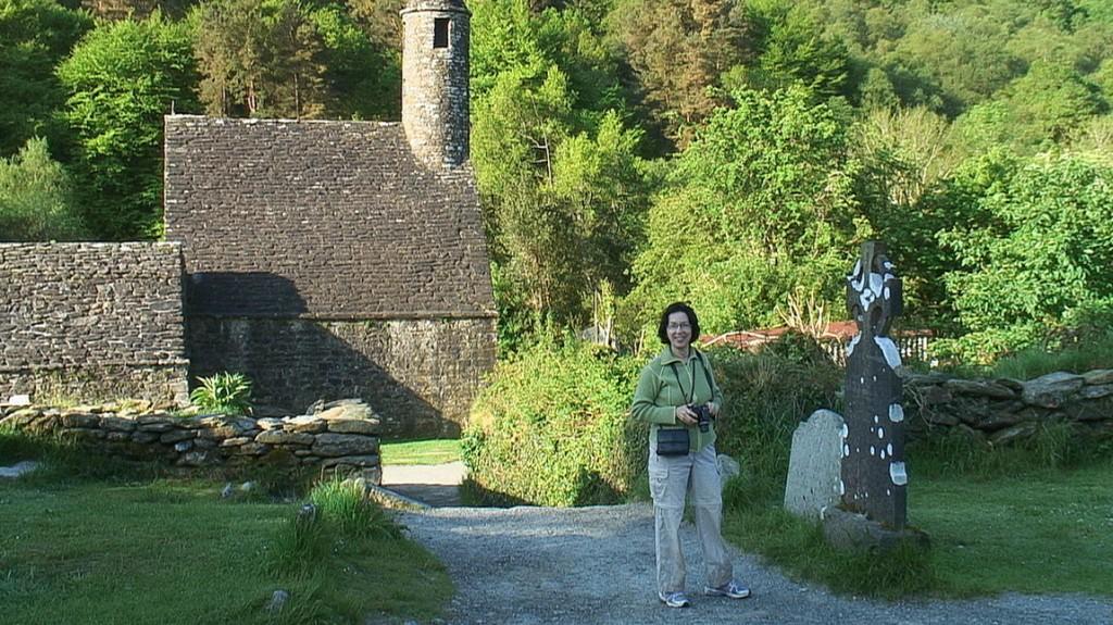 Glendalough, one of the most beautiful places in Ireland Jean in front of St Kevins Church at Glendalough - Ireland