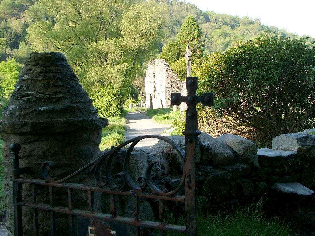 Glendalough, one of the most beautiful places in Ireland Stone fence and gate to Glendalough Cathedral - Wicklow Mountains - Ireland