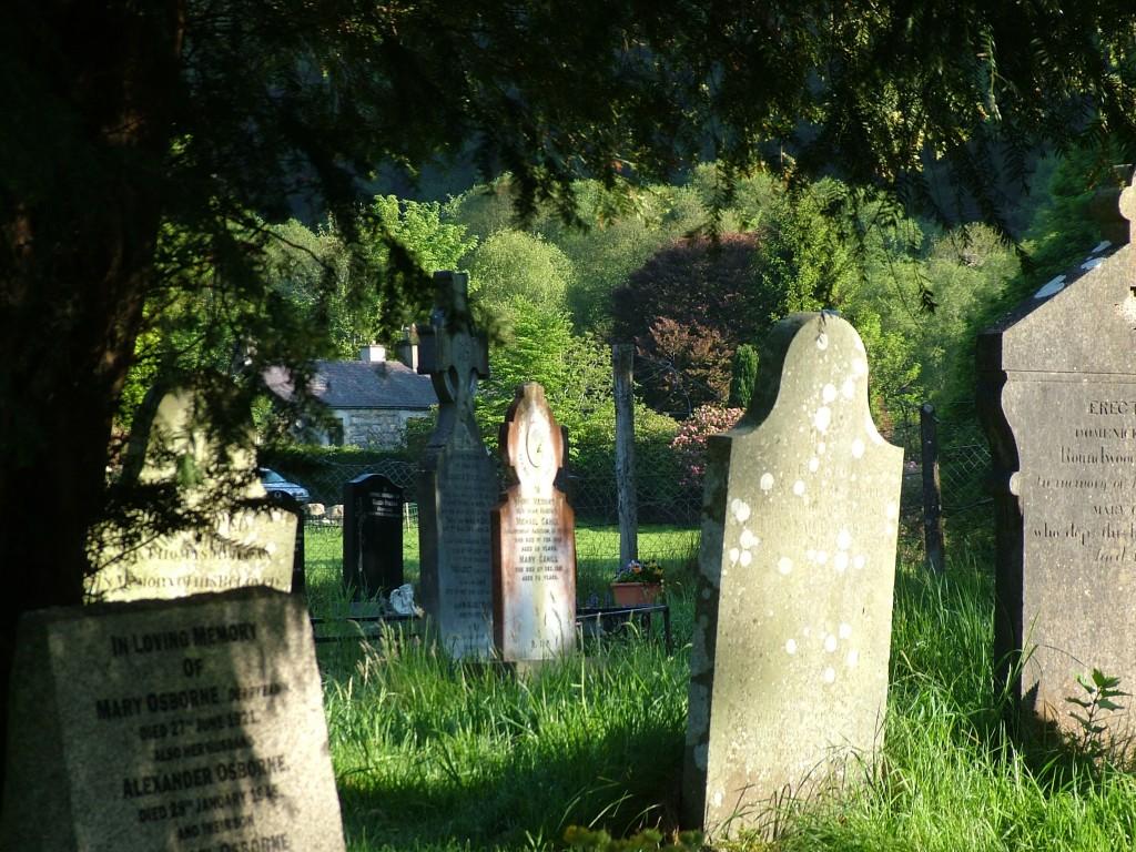Glendalough, one of the most beautiful places in Ireland tombstones in Glenalough Cathedral graveyard - ireland