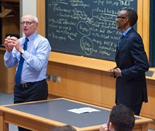 Paul Kagame and Professor Michael Porter of Harvard University - photo/Jimmy Ushkurnis