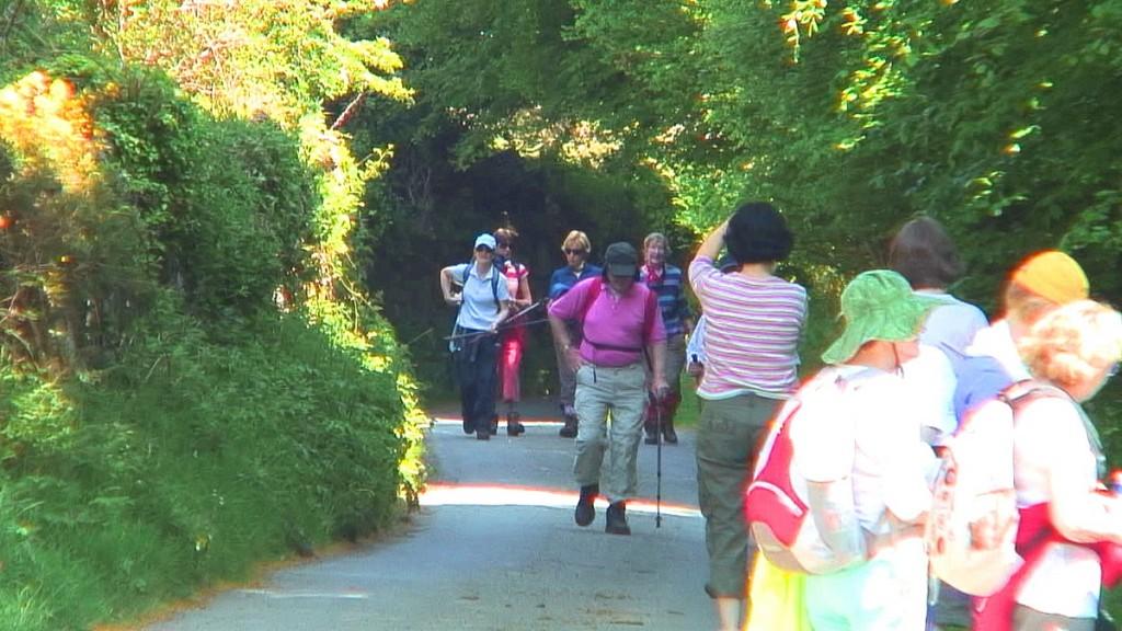 Driving the Intriguing Backroads of Wicklow County – Ireland Jean takes a picture of hikers - Wicklow - Ireland