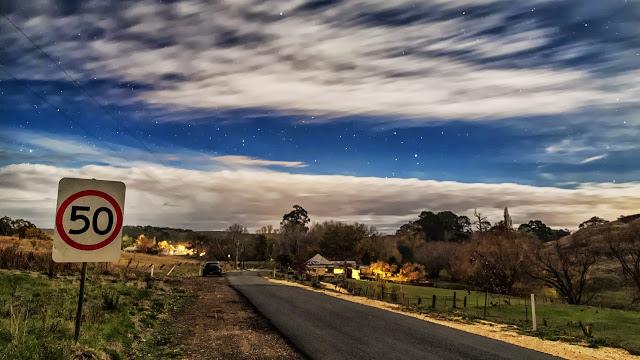 country road under moonlight