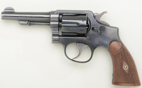 Clyde Barrow’s Dapper Dark Pinstripe Suit A .38 Special Smith & Wesson, much like the one carried by Warren Beatty as Clyde Barrow.