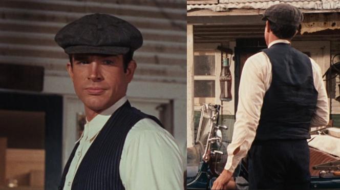 Clyde Barrow’s Dapper Dark Pinstripe Suit This was considered
