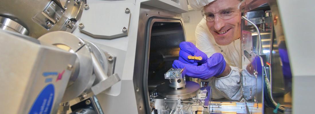 CFN's Kim Kisslinger, seen here with a focused-ion beam instrument, reduced the InGaN samples to a thickness of just 20 nanometers to prepare them for electron microscopy. (Credit: BNL)