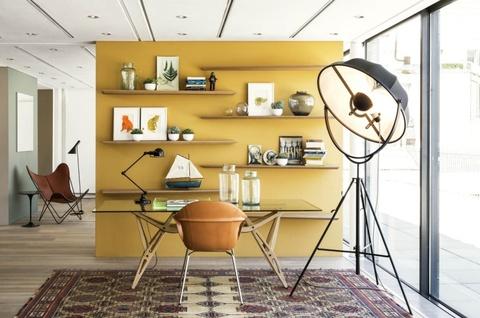 The Conran Shop, Marylebone, has arranged an office with a Carlo Mollino Reale table as a desk, complemented by a Fortuny floor lamp, French industrial Signal task lamp, and Elephant chair by Kristalia. 